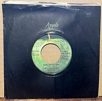 Front of sleeve showing record through center hole