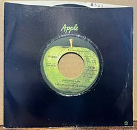 Record inside black Apple sleeve