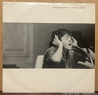 Front of picture sleeve showing artwork and title