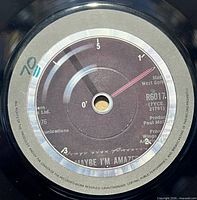 A-side label showing "Maybe I'm Amazed", catalogue R6017
