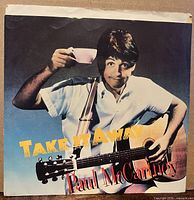 Front of picture sleeve featuring Paul McCartney image and title