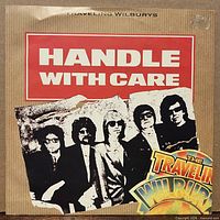 Front of picture sleeve showing artwork and small sticker stain