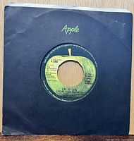 Front of single in black Apple sleeve