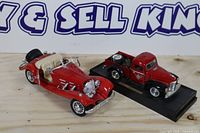 Both diecast vehicles side by side showing overall condition and color scheme