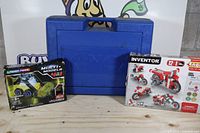 Boxed Laser Pegs set, Engino set and K'NEX case overview