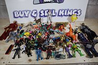 Overall lot showing variety of action figures, vehicles and accessories