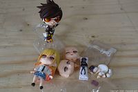 Both figures, stands and loose accessories overview
