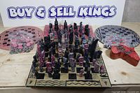 overall lot with chess set, two circular boards, extra board, and bags of tokens