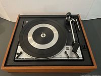 Overall view of Dual 1214 turntable showing plinth, platter and tonearm