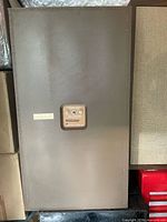 Rear view of one speaker showing connection panel