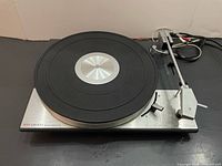 Full view of Lenco B55 turntable deck with tonearm and platter