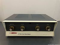 Front view showing entire amplifier, controls and enclosure