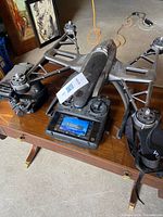 Top view of drone on table with controller beneath