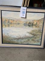 Front view of framed painting showing full artwork and frame