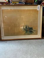 Framed painting showing fishing boat scene