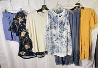 Group shot of all six size small garments on hangers