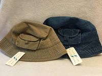 Both hats front view showing colors and tags