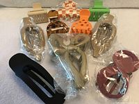 Group shot showing all ten hair claw clips in various shapes and colours