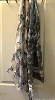 Both scarves hanging to show overall appearance and colors