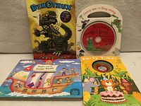 Front view showing all four children’s board books