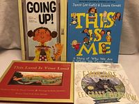 Group shot of all four children’s books front covers