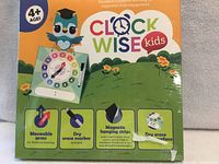 Front of sealed ClockWise Kids Teaching Clock box showing features and age range