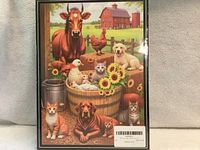 Front of sealed puzzle box showing farm animal artwork