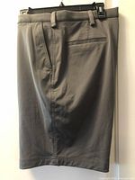 Back view of grey Haggar shorts showing length and rear welt pocket