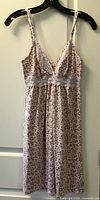 Front view of pink floral lace-trim nightie on hanger