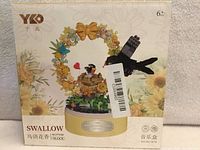 Front of sealed YKO Swallow music box block set box