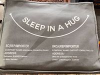 Front of carrying bag showing branding Sleep In A Hug