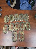 All 13 Amerock cover plates front view showing 5 switch and 8 outlet plates