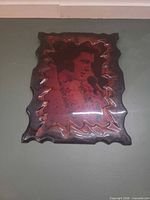 Front view showing Elvis image, resin gloss and scalloped wood edges