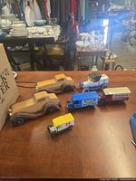Group shot of all six toy vehicles on table
