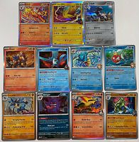 All twelve Pokémon cards arranged in four rows of three