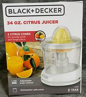 Front of retail box showing brand, capacity and juicer image