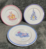 Front view of all three plates showing graphics and rim colours