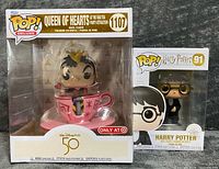 Front view of both Funko Pop! boxes showing Queen of Hearts #1107 and Harry Potter #91