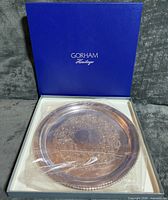 Tray inside original Gorham Heritage box with plastic wrap, showing beaded rim and engraved floral surface