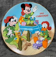 Front view of plate showing Disney characters and 1993 Christmas text