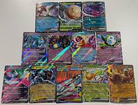 All 13 Japanese and Korean Pokémon holographic cards displayed