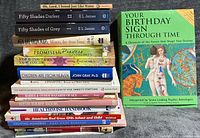 Front view of all 16 book spines and covers