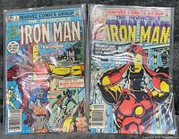 Front covers of Iron Man Annual #5 and Issue #170 in bags