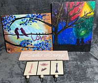 All four items: two canvas paintings, Ladies Lounge sign, 3-hook rack