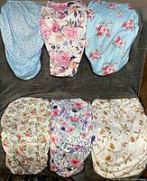 All six floral oval fitted sheets displayed