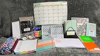 Full lot overview of planners, notebooks, calendar board, organizer, pouch and accessories