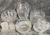 Group shot showing all eight cut glass pieces