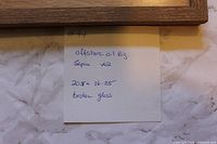 Note describing lot details including measurements and broken glass