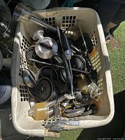 Basket filled with assorted garden path light parts