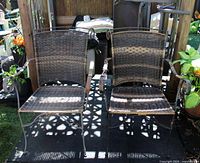 Front view of both wicker patio chairs